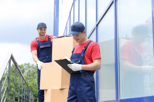Removal company truck and movers in Kingscross street