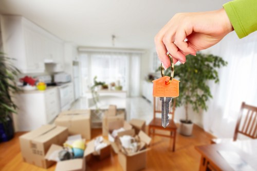 Removal team preparing items for a booked moving service