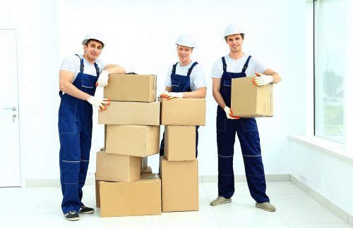 Removal team packing boxes for urgent Kingscross relocation