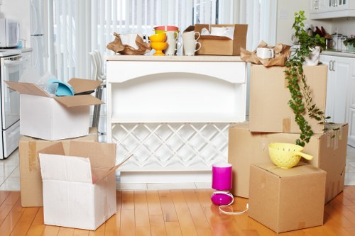 Professional team handling large furniture items in Kingscross