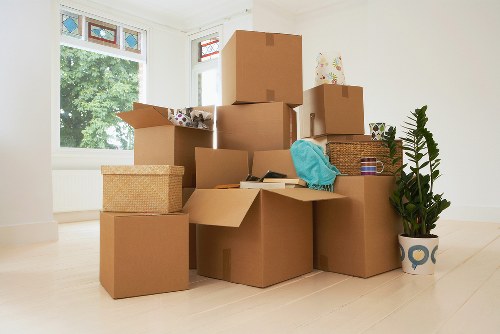 Professional removals crew following safe working practices