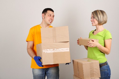 Boxes and furniture being unloaded into a new Kingscross flat
