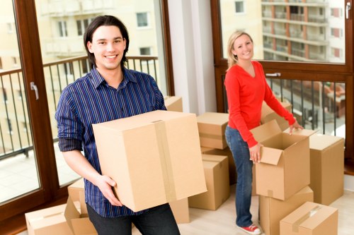 Team handling furniture safely during a move